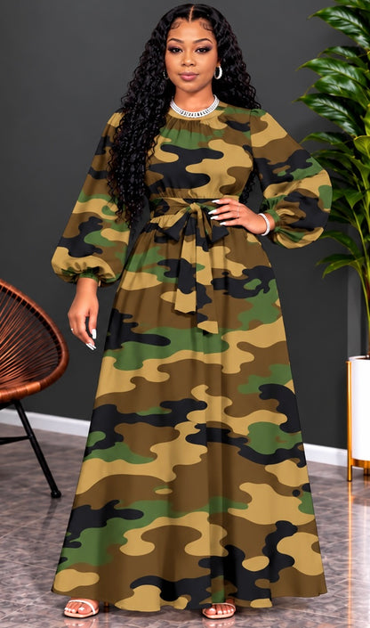 Women’s Plus Size Camouflage Print Maxi Dress

Step out in style with this beautiful plus-size camouflage maxi dress. Featuring elegant lantern sleeves, a flattering A-line silhouette, a round neckline, and an adjustable tie waist for a comfortable, femin